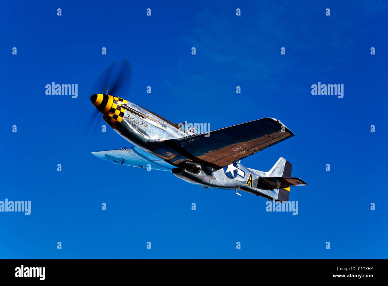 A P-51D Mustang Kimberly Kaye in flight near Chino, California. Stock Photo