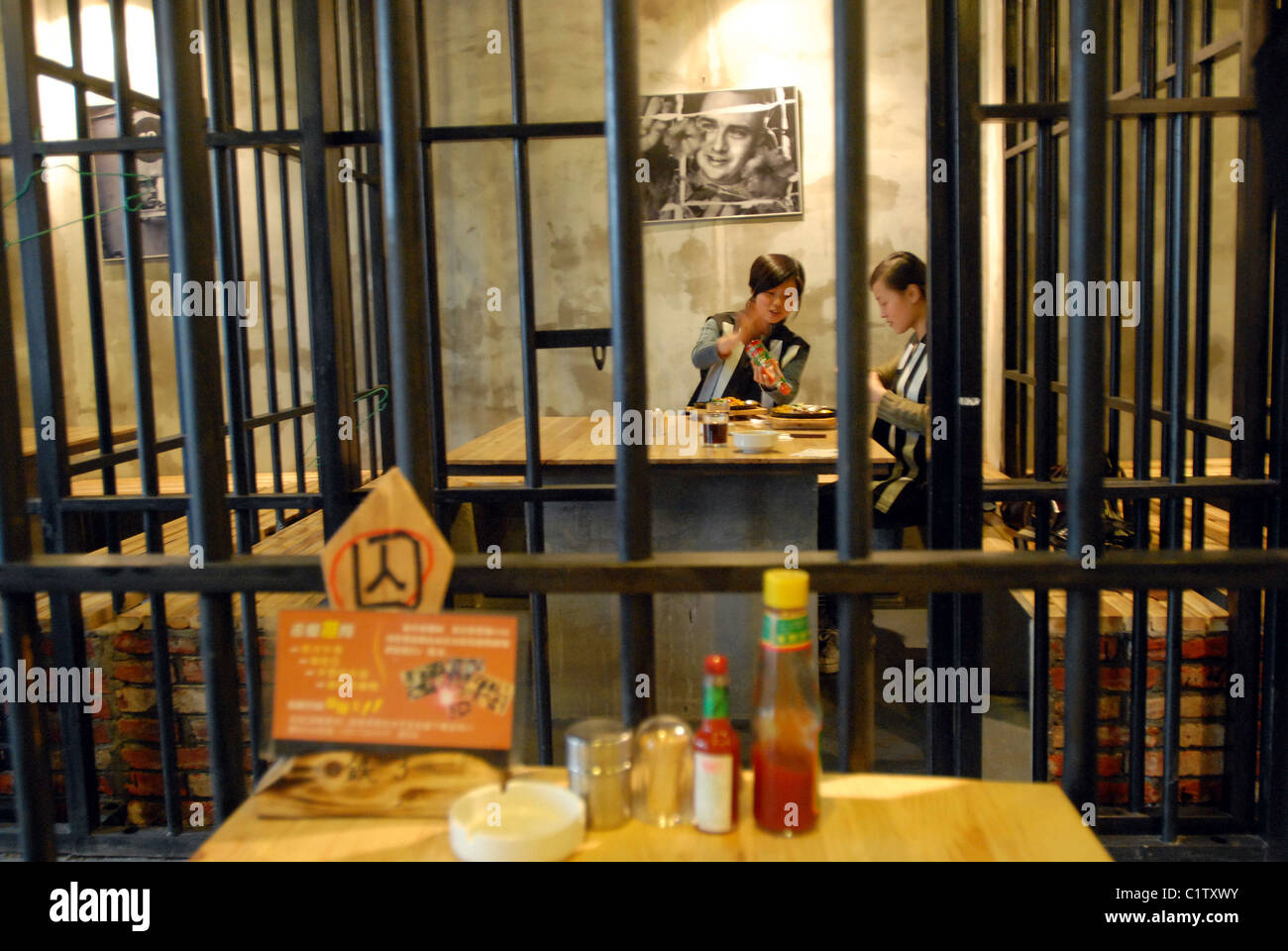 A prisonthemed steak restaurant in Wuhan China April 2008