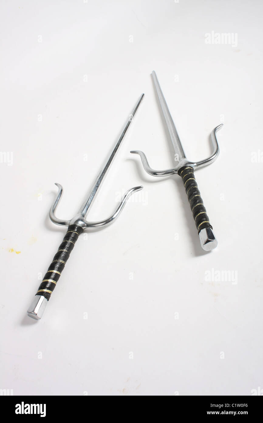 A pair of Egyptian style sai daggers; blunt for martial arts training and competitions. Stock Photo