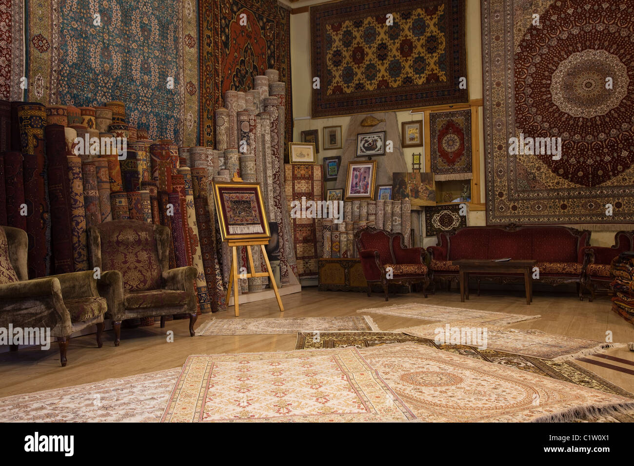 Interior of a carpet bazaar selling Turkish carpets with religious and