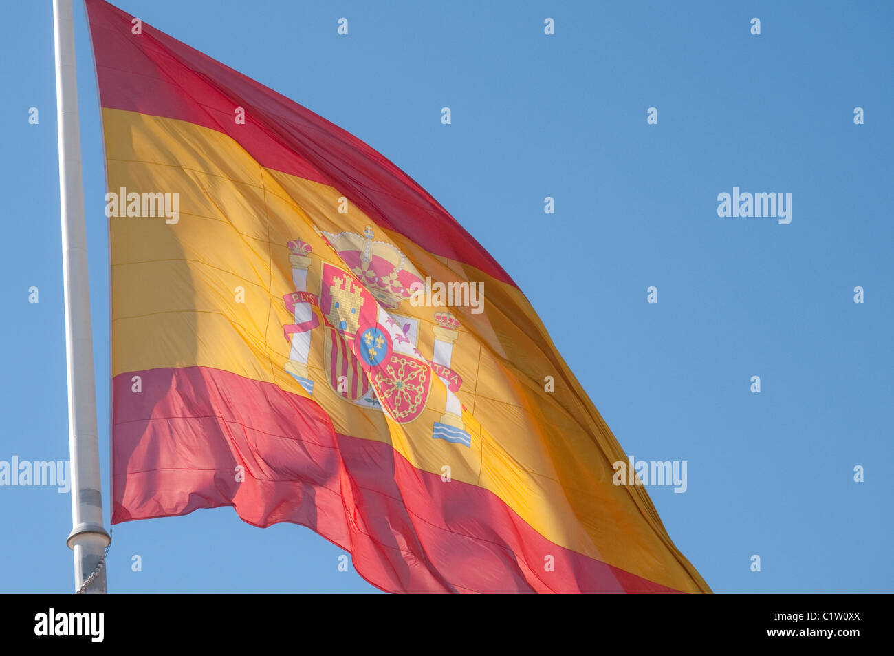 spanish flag blowing in the wind Stock Photo