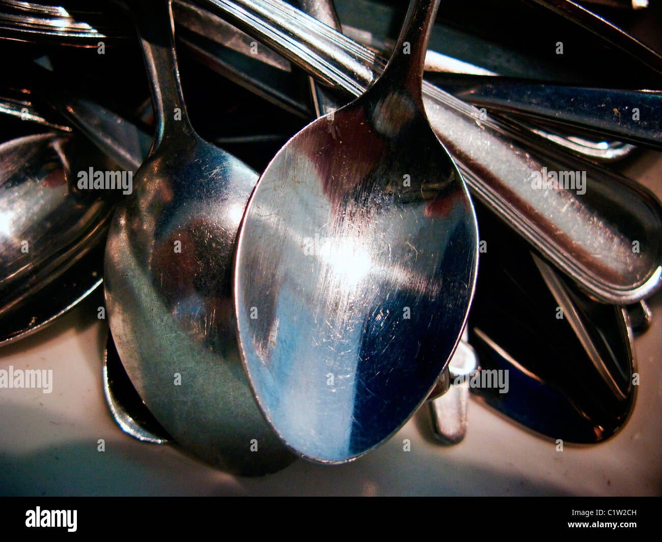 Closeup of spoons in a commercial kitchen Stock Photo Alamy