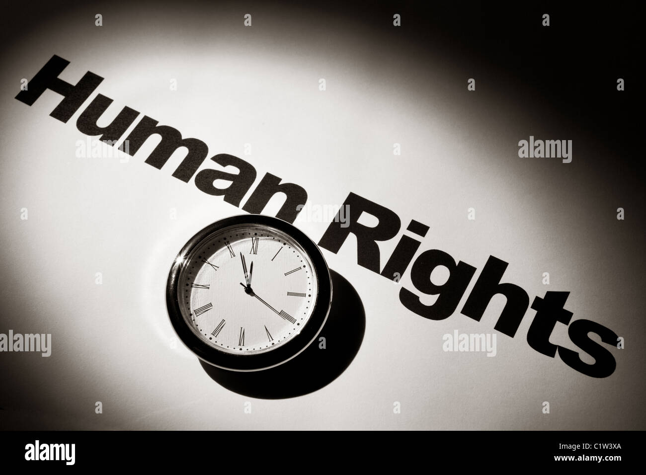 Clock and word of Human Rights for background Stock Photo