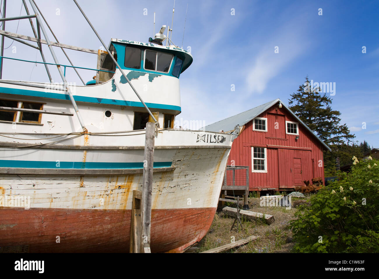 Fishing boat with a museum in the background, Cannery Museum, Icy ...