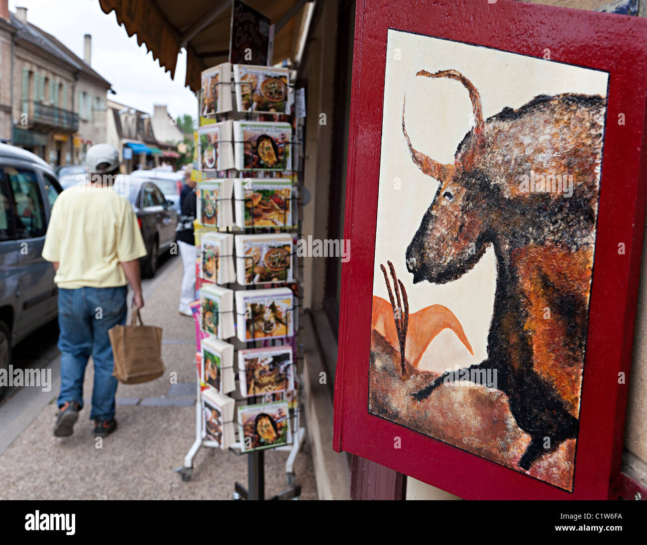 Cave art painting on sale in street Les Eyzies Dordogne France French Europe Stock Photo