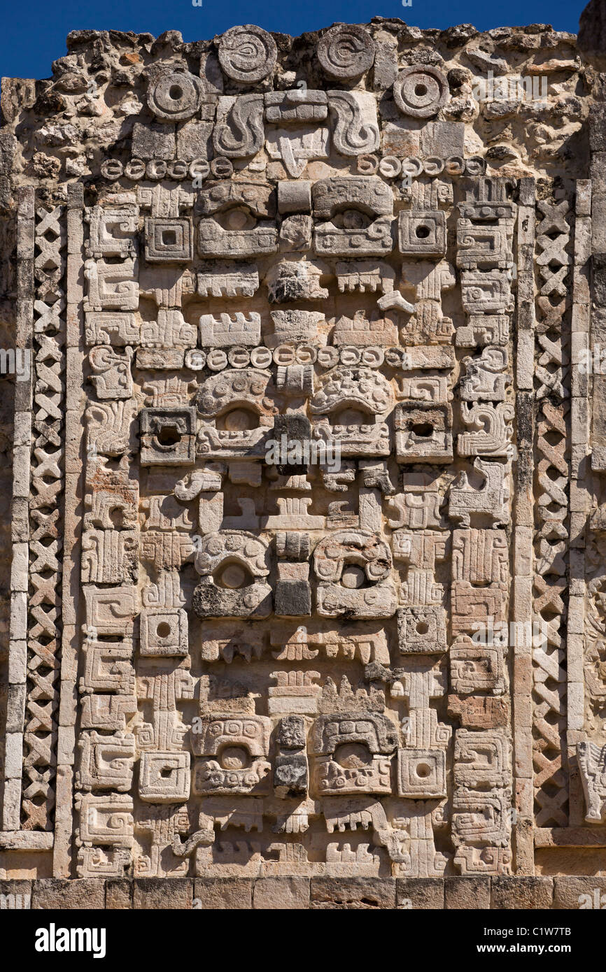 Intricate facade of Chac masks in the Nunnery Quadrangle in the Puuc style Maya ruins of Uxmal, Mexico. Stock Photo