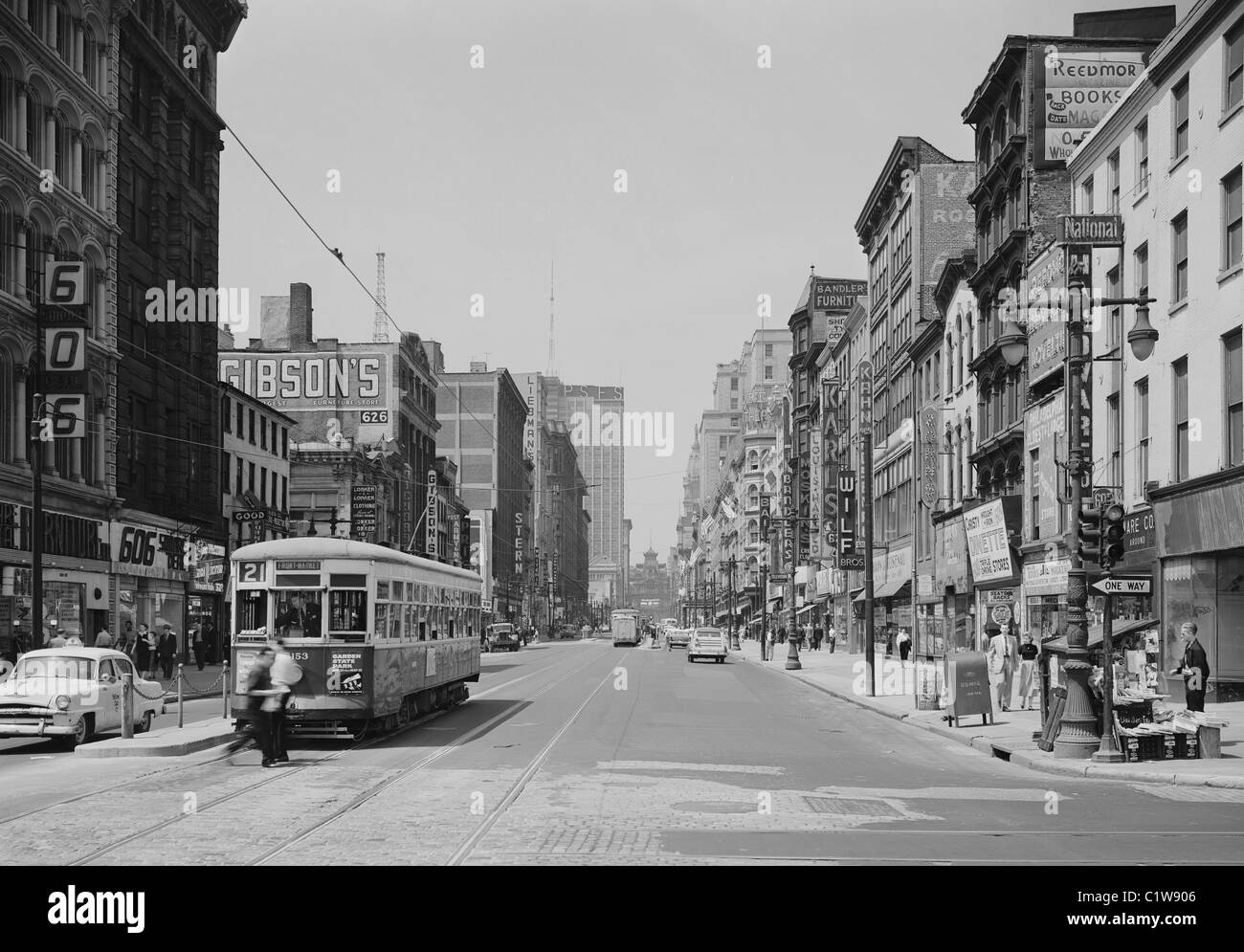 USA, Pennsylvania, Philadelphia, Pedestrians and tram on Market Street Stock Photo
