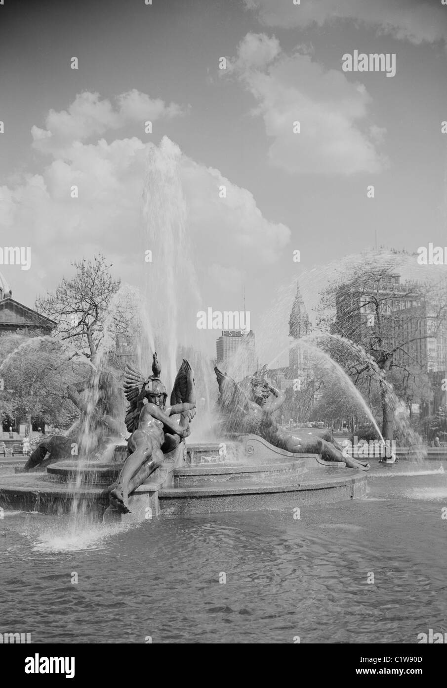 USA, Pennsylvania, Philadelphia, Fountains at Logan Circle with midtown skyline in background Stock Photo