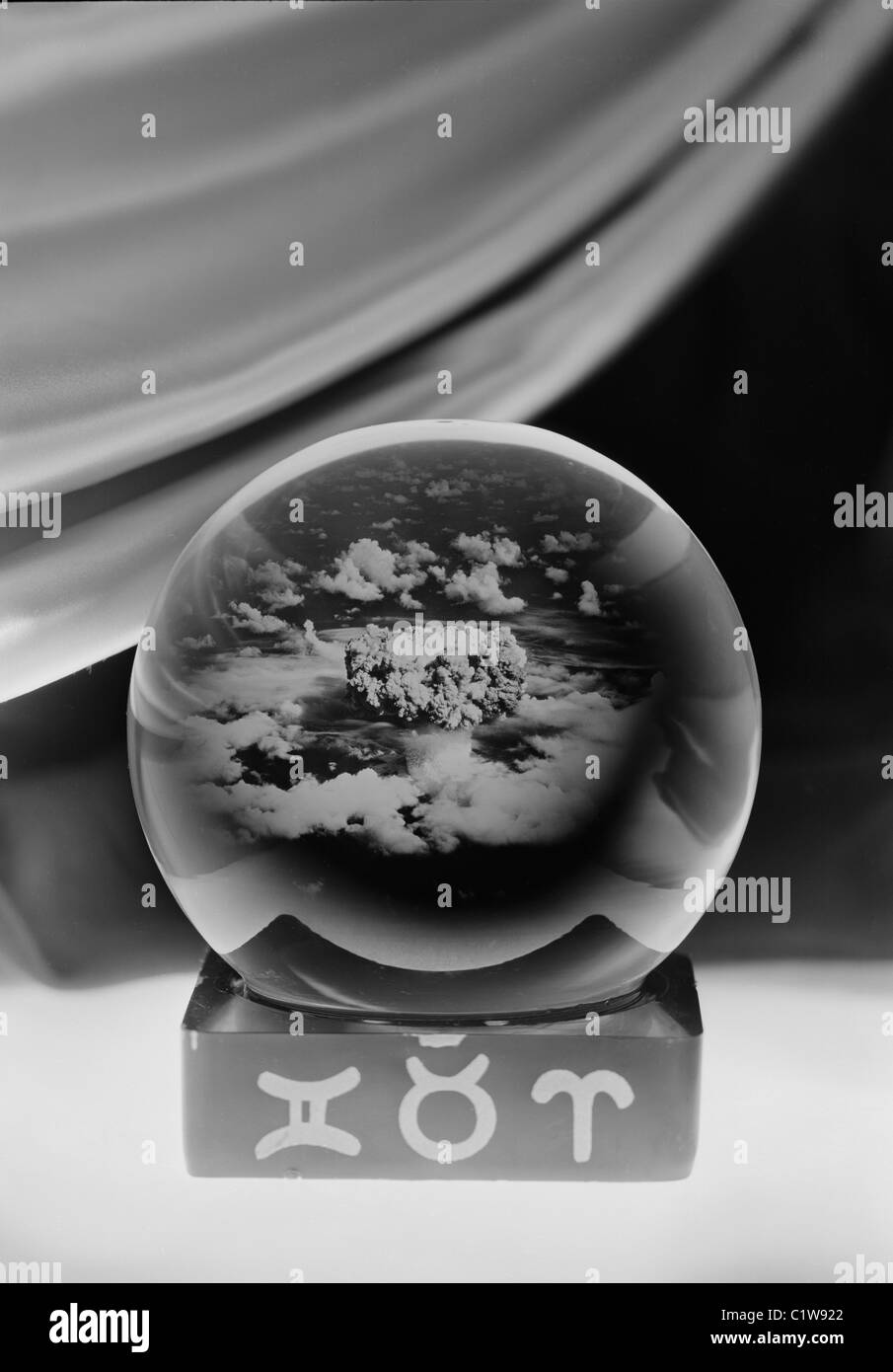 Crystal ball showing bomb explosion Stock Photo