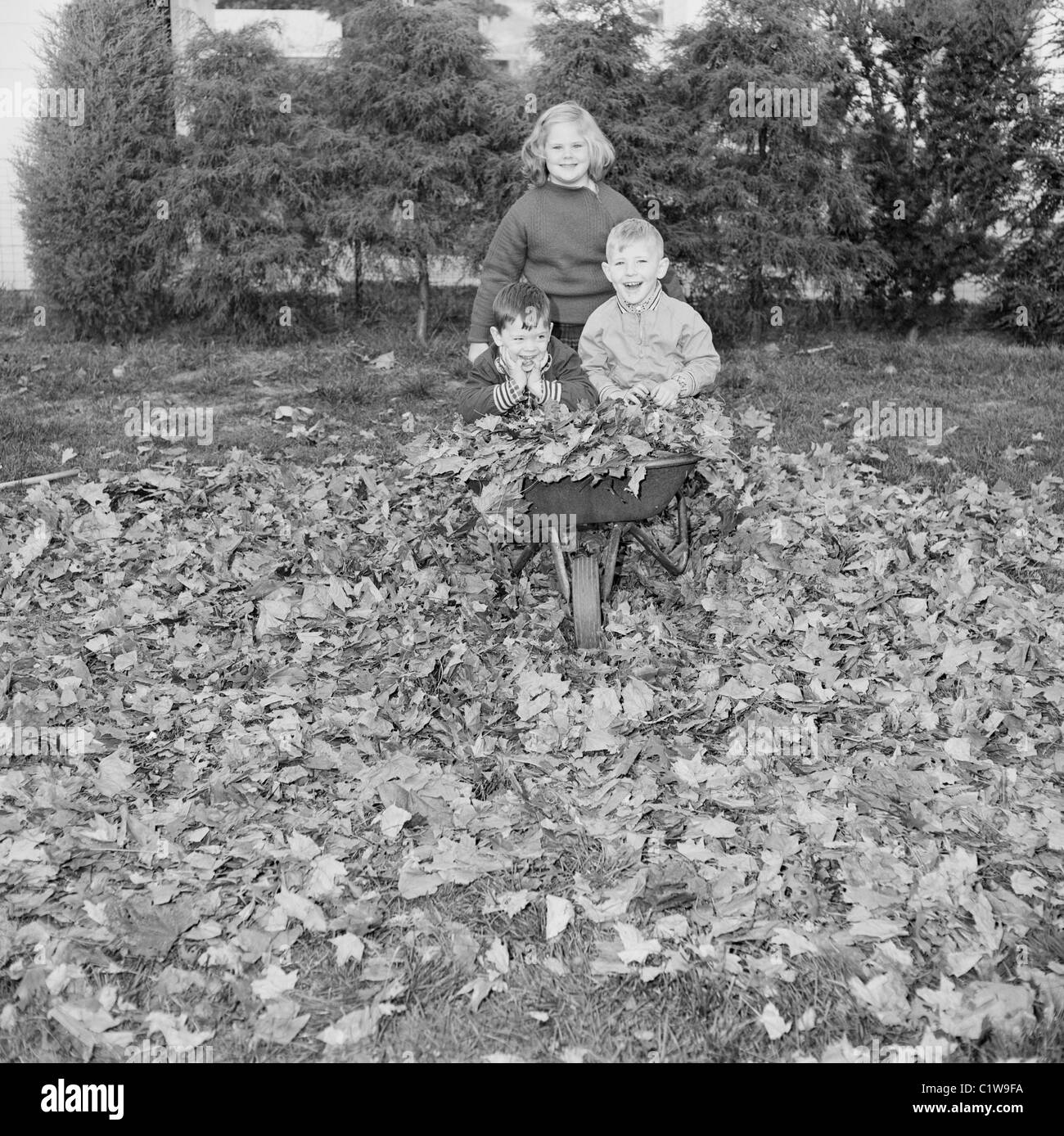 three-children-sibling-brothers-black-and-white-stock-photos-images
