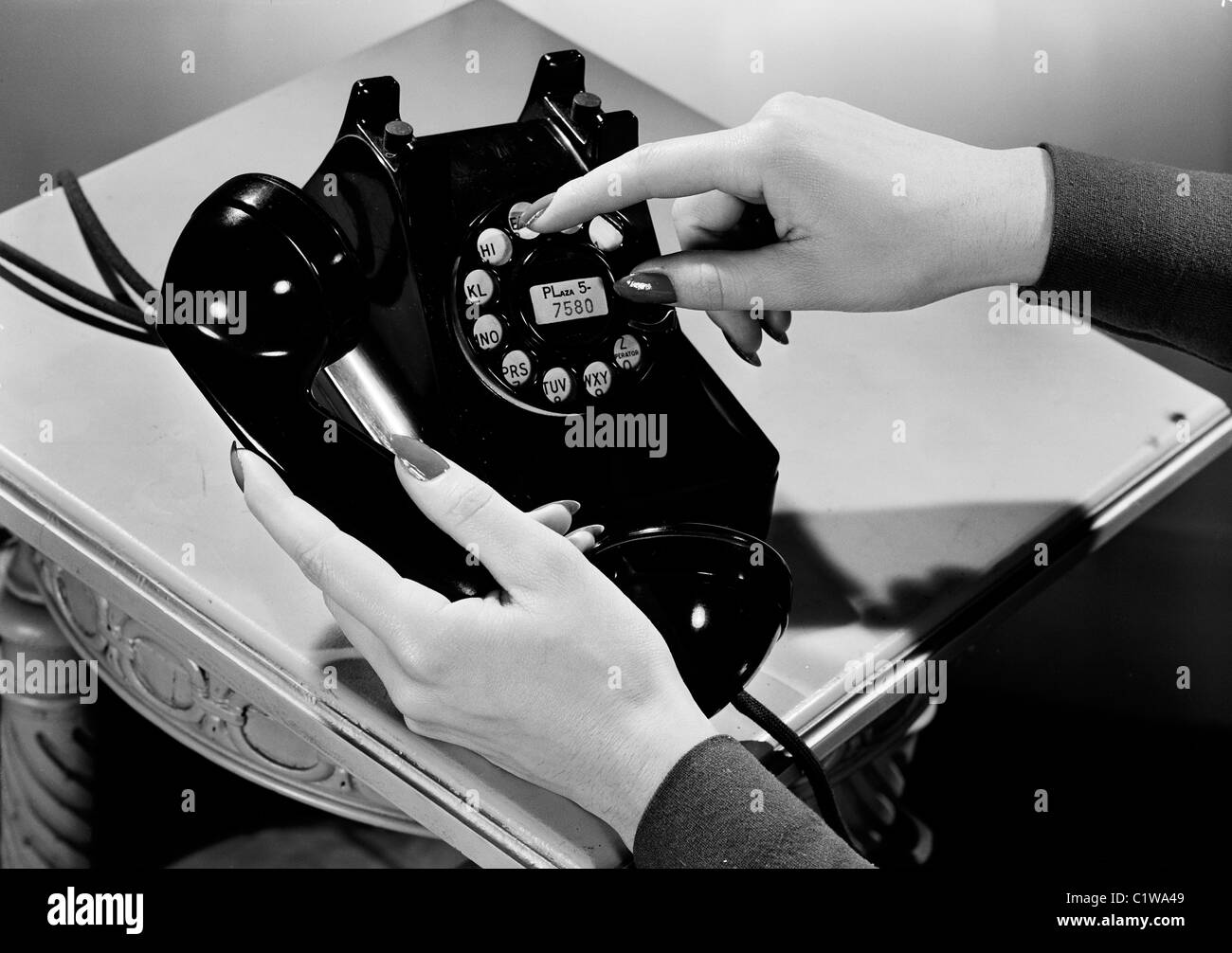 Woman holding vintage telephone Stock Photo