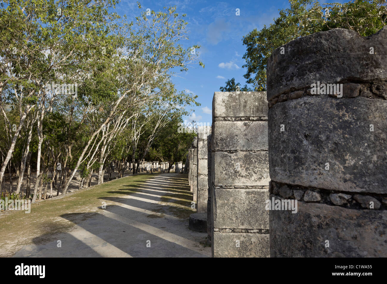 Stone columns lining El Mercado in the Late Classic Maya ruins of Chichen Itza, Yucatan Peninsula, Mexco. Stock Photo