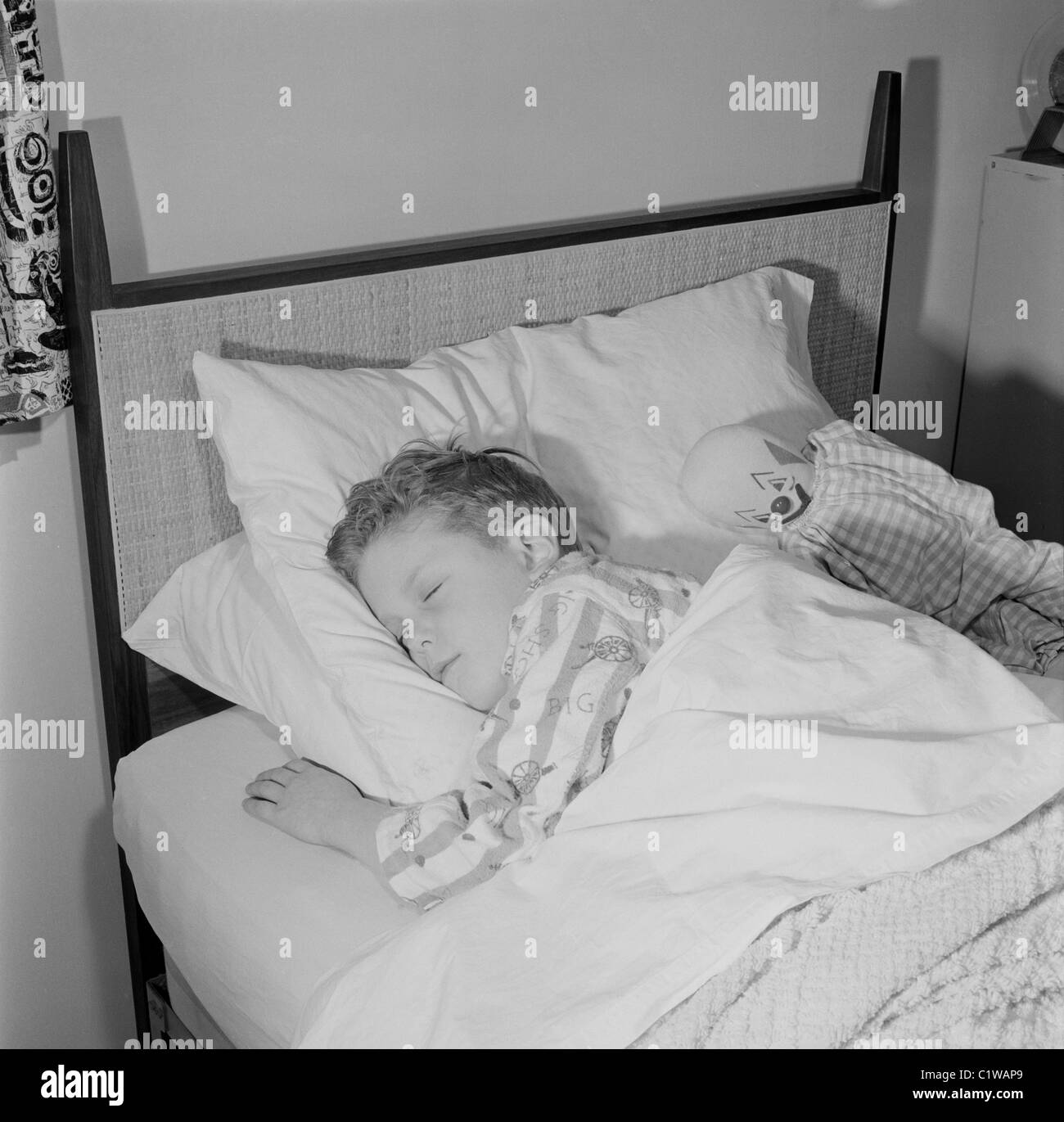 Boy lying down Black and White Stock Photos & Images - Alamy