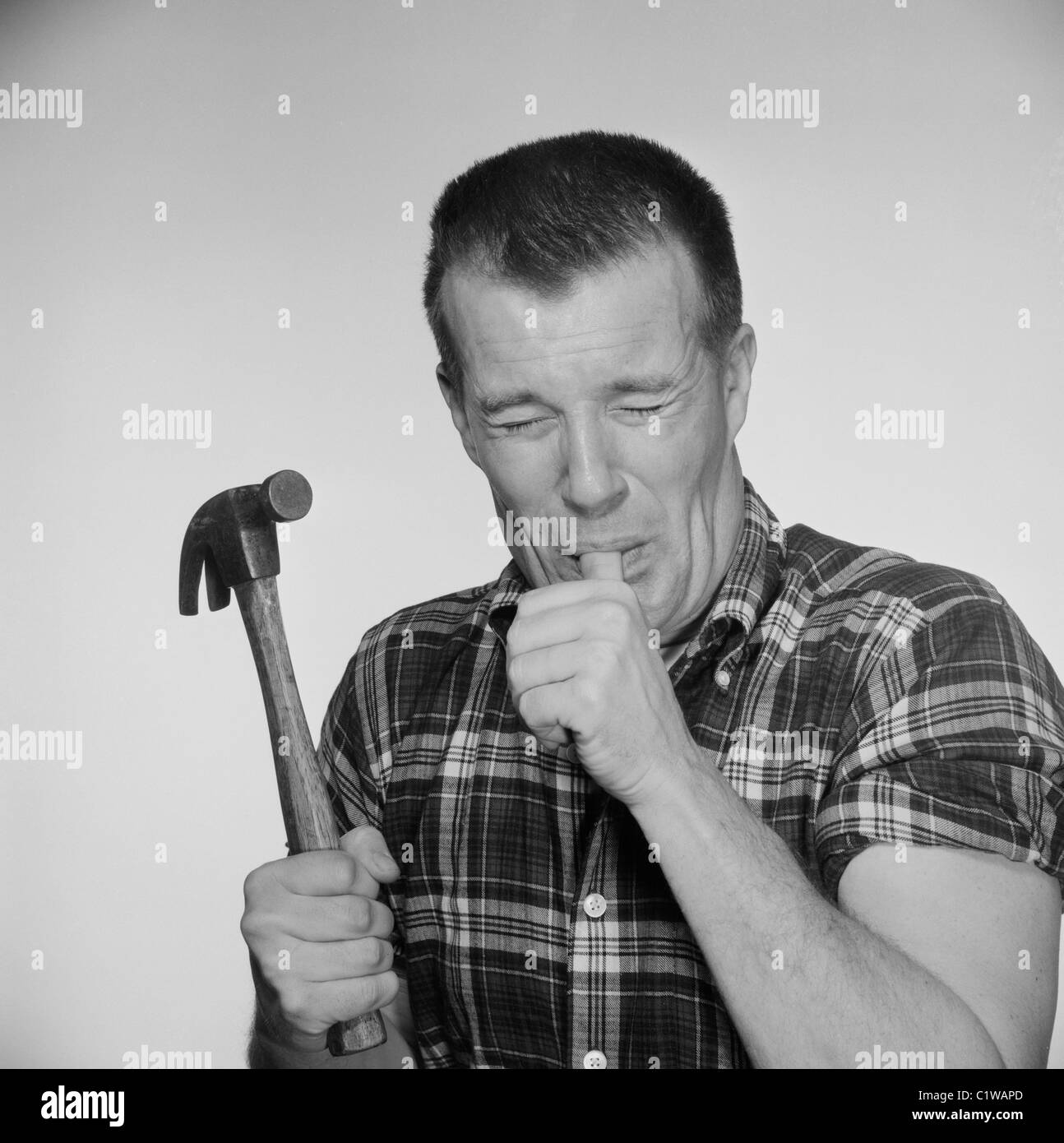 Man hammer black and white hires stock photography and images Alamy