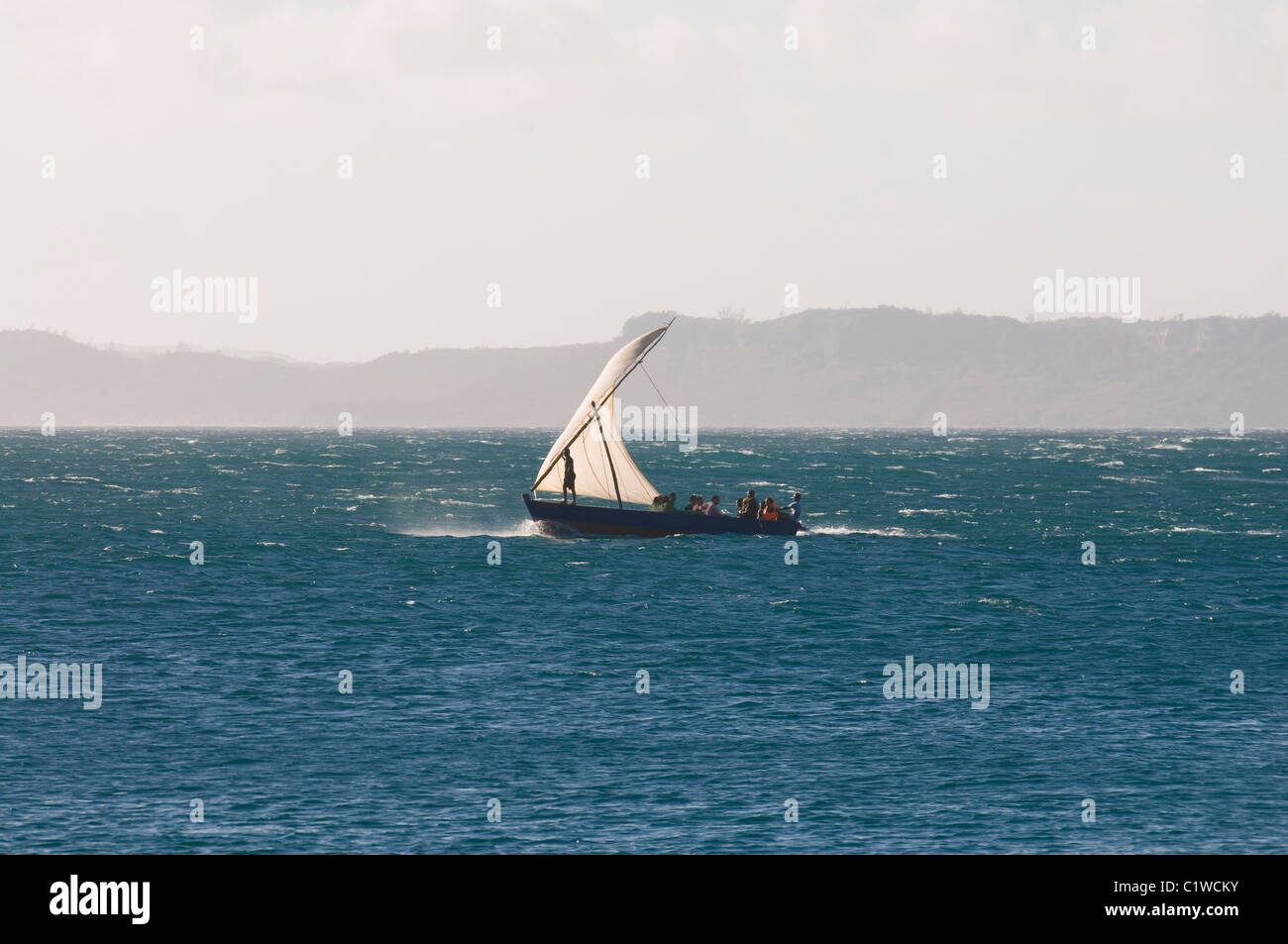 Madagascar, Diego Suarez, Fishing boat sailing at sunset Stock Photo