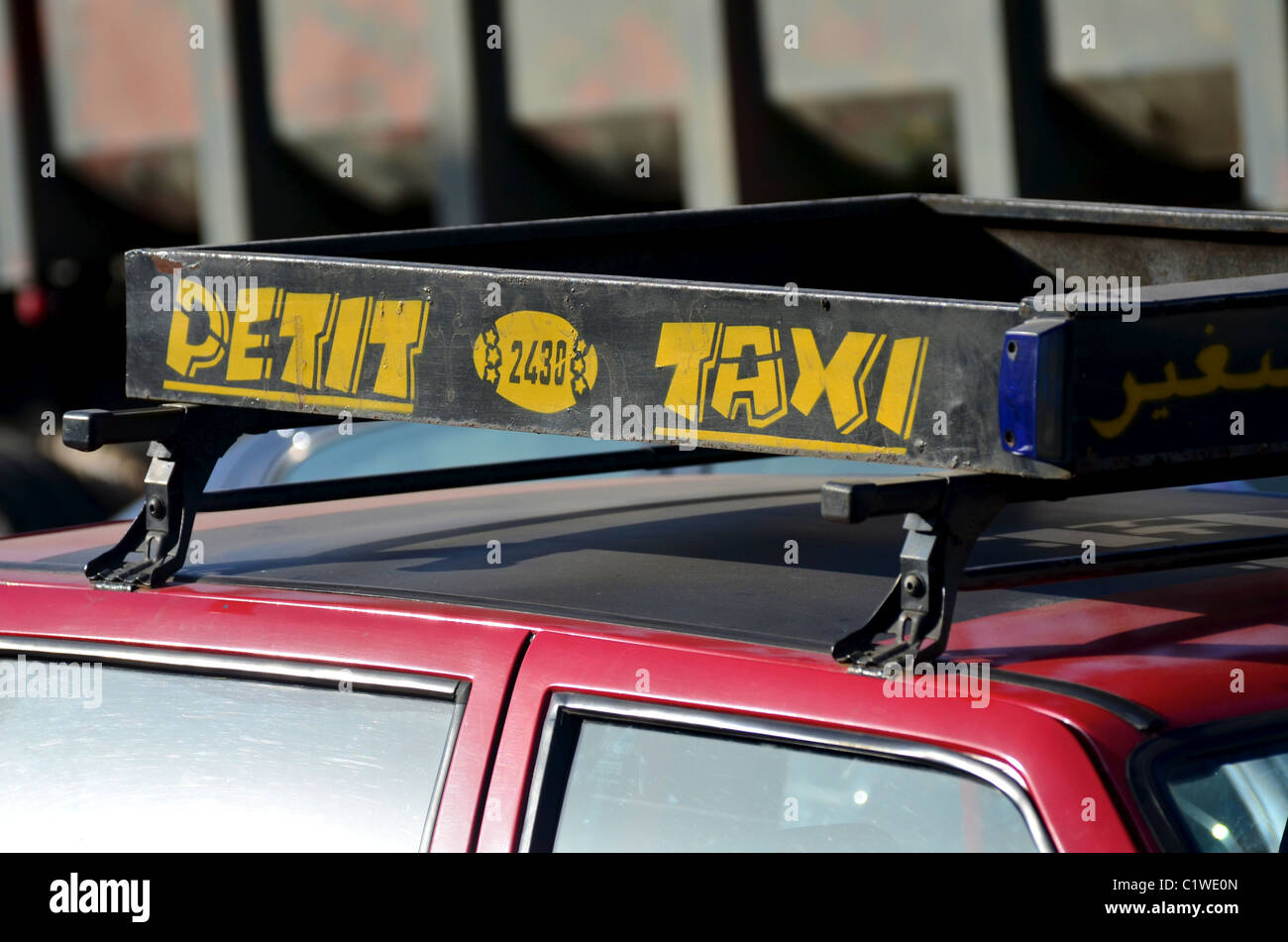 Petit taxi, Casablanca, Morocco.  The sign atop the roof of a small taxi in the Moroccan coastal city of Casablanca Stock Photo