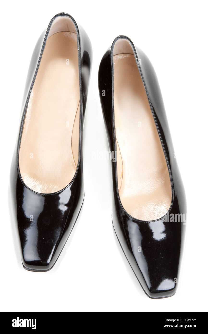 Black feminine varnished loafers on white background Stock Photo Alamy
