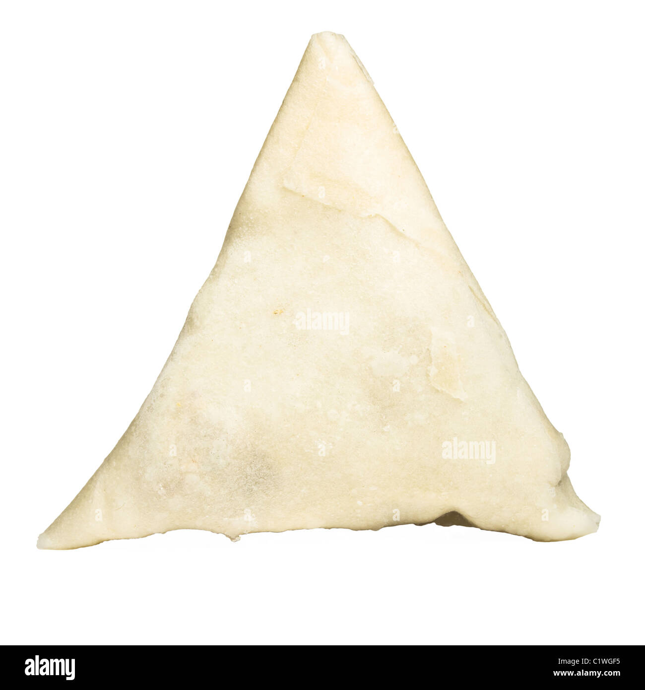 Uncooked Frozen Samosa isolated on white prior to cooking. Stock Photo