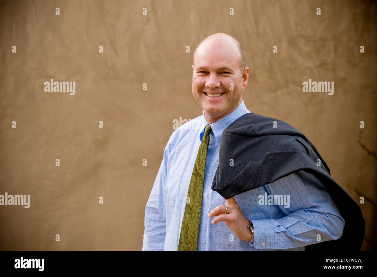 Portrait of a businessman smiling Stock Photo - Alamy
