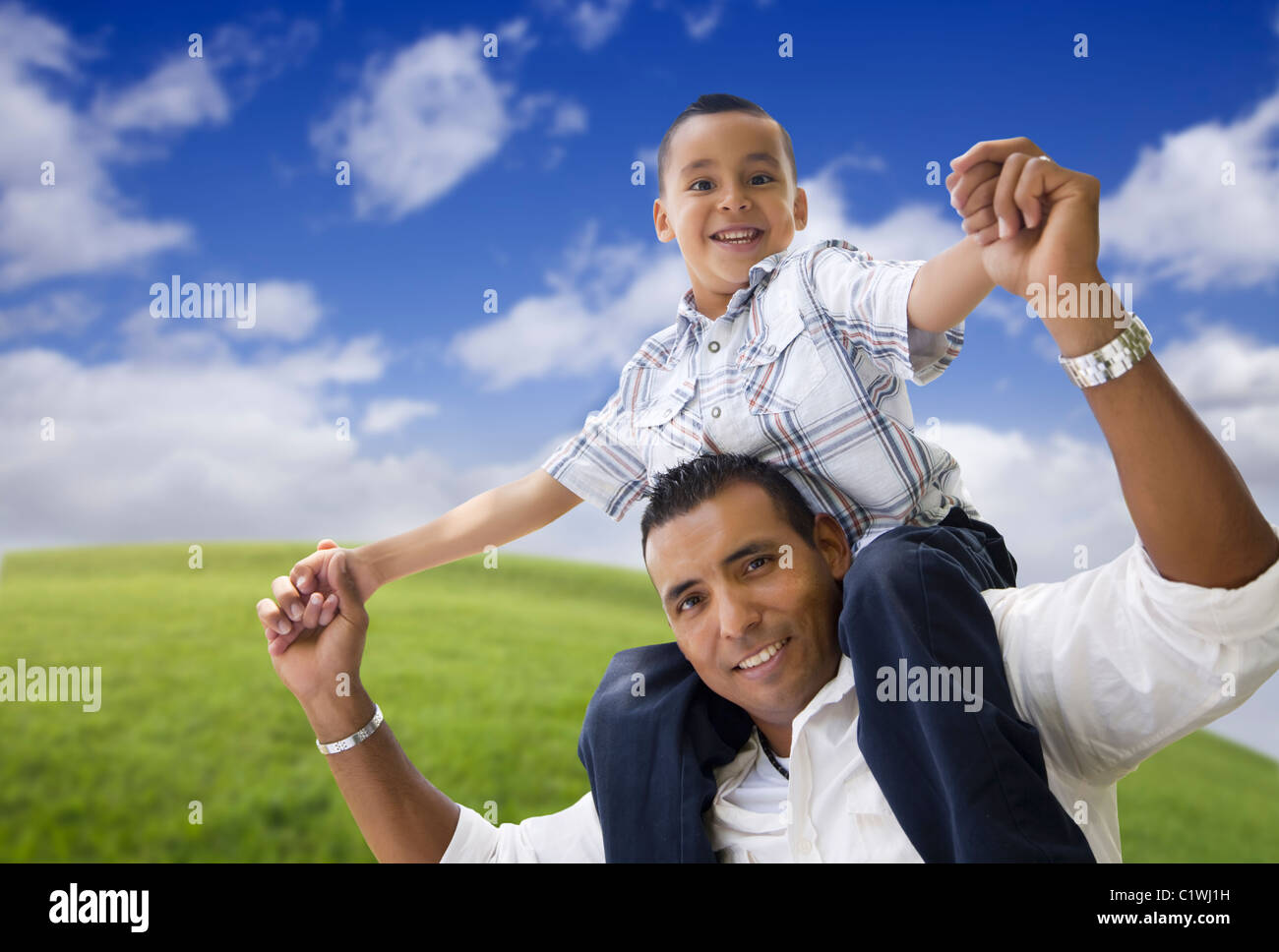 Hispanic Father and Son Having Fun Together in the Park Stock Photo - Alamy