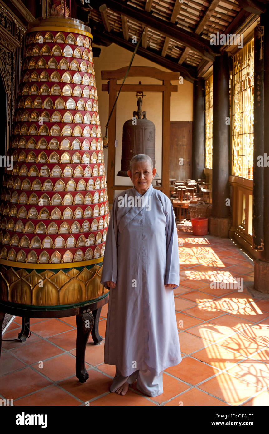 Lady Monk in Vinh Trang Pagoda Stock Photo