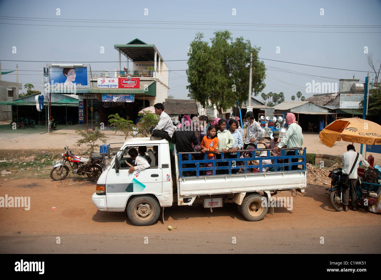 Truck full of People in Rural Cambodia Stock Photo