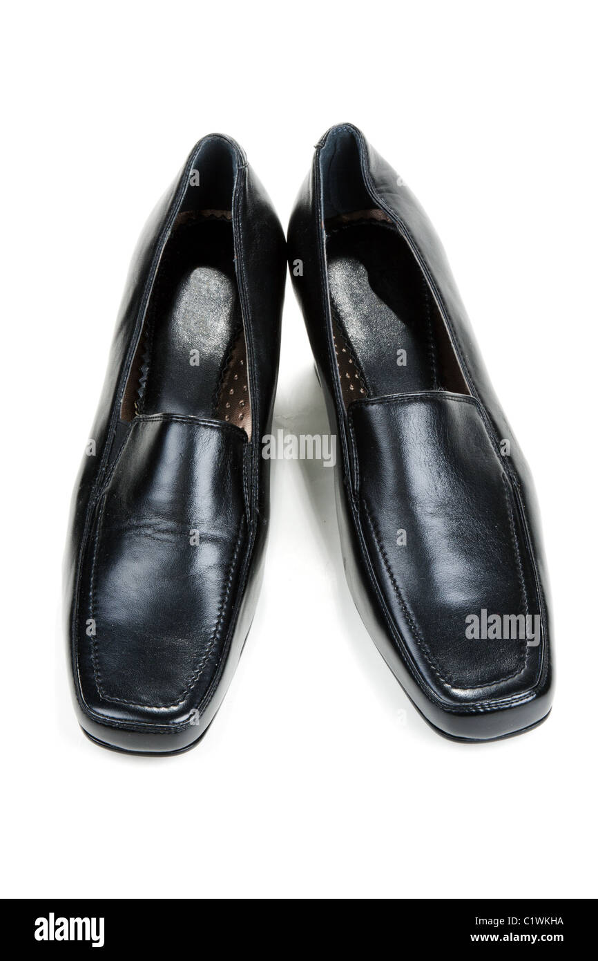 Black feminine loafers on white background Stock Photo - Alamy