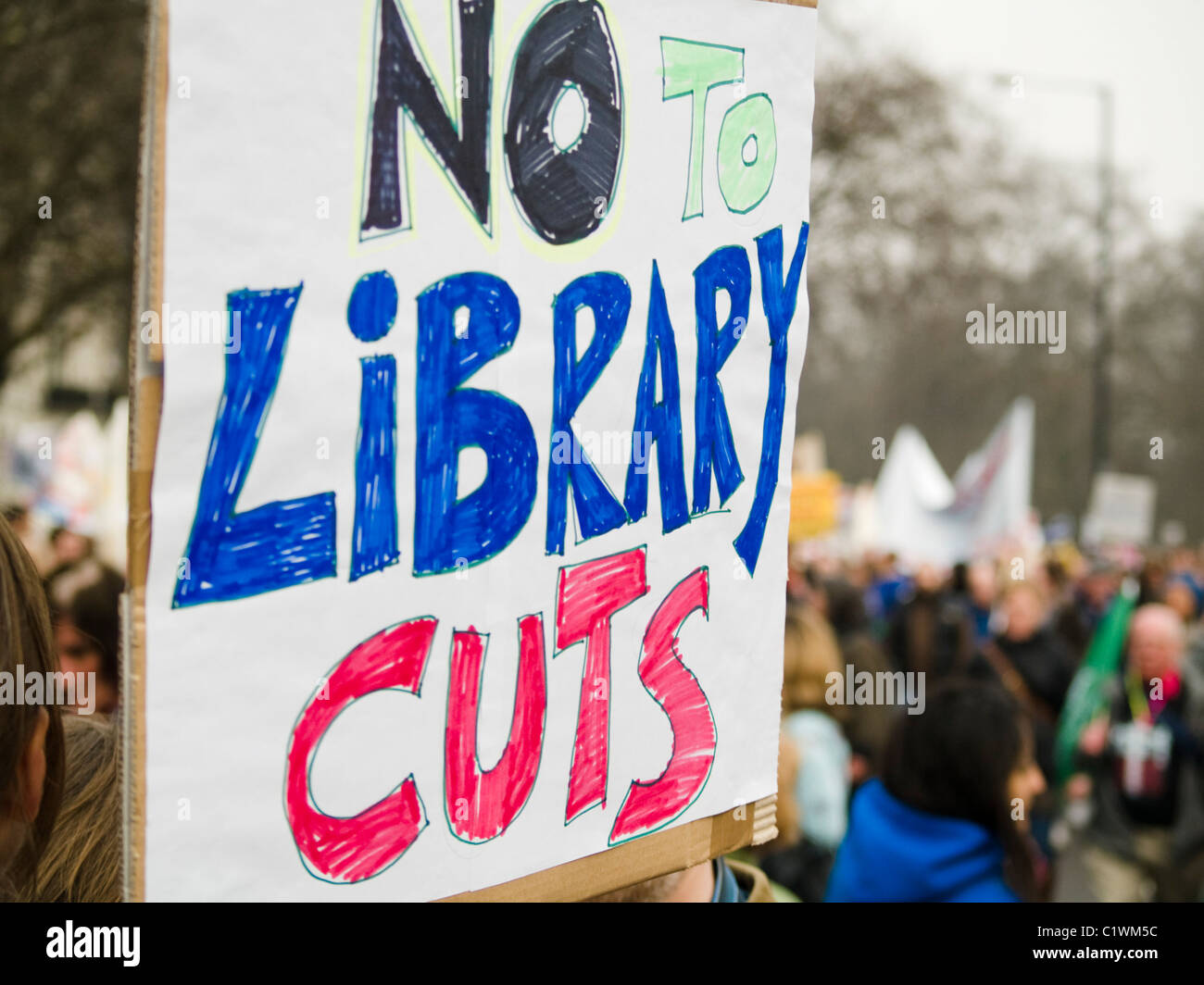 A placard protesting against cuts to public libraries during the anti Government protests on 26 March 2011 in London. Stock Photo