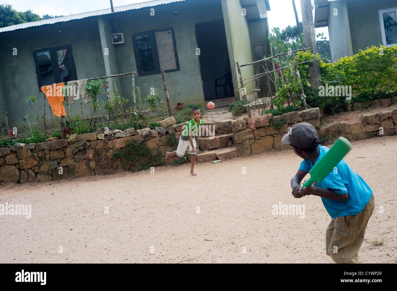 Galle, Sri Lanka - 27th, 2011:Srilankan boys playing cricket Stock Photo