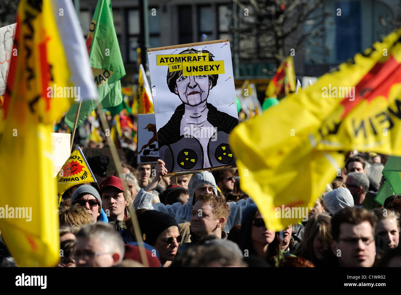 GERMANY Hamburg, large rally and public meeting at townhall market against nuclear power after accident Fukushima, image of chancellor Angela Merkel Stock Photo