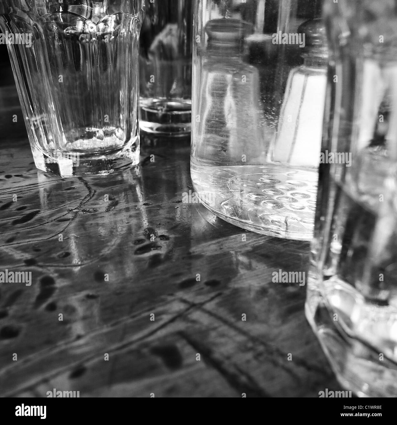 Clear glassware on restaurant table. Stock Photo