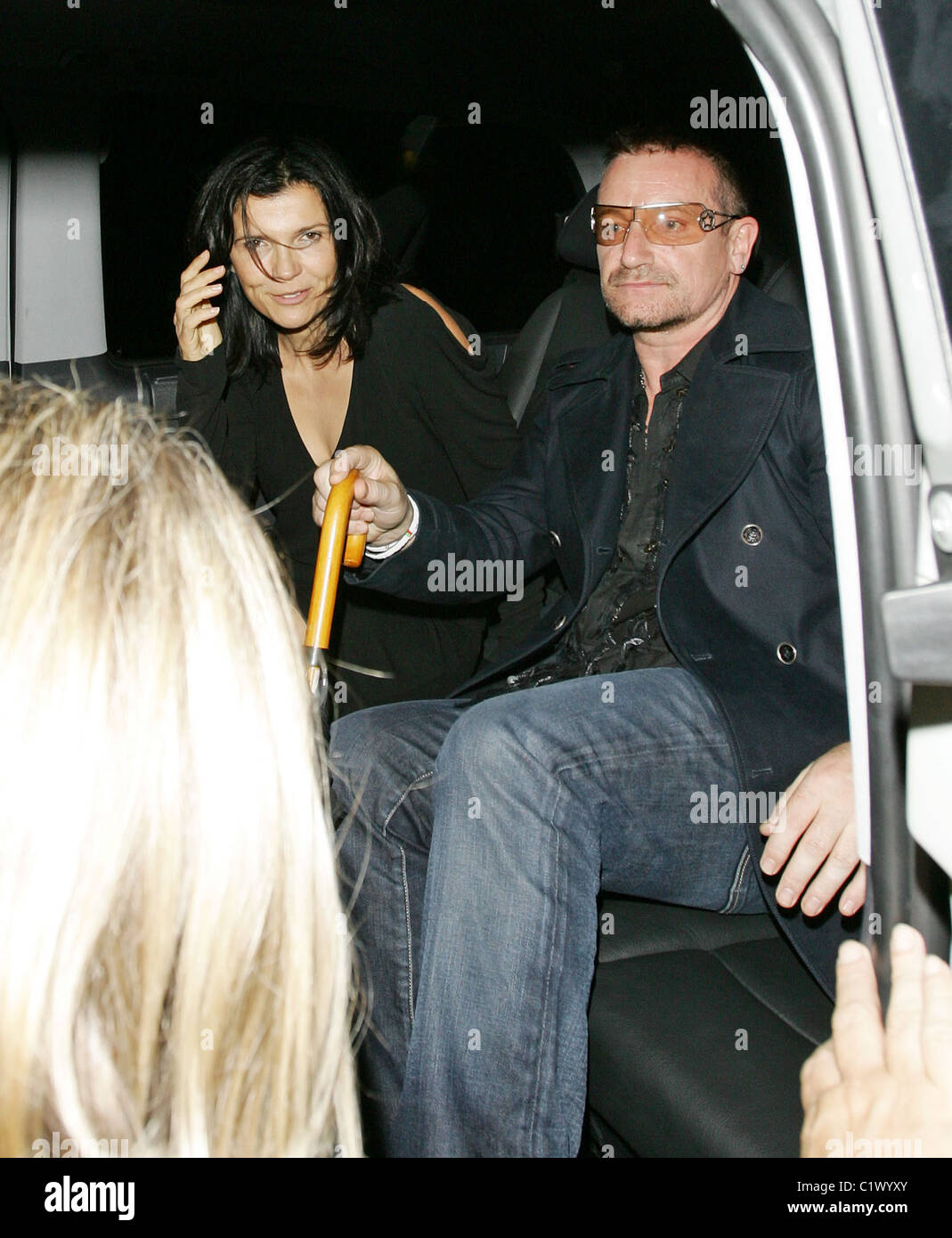 Bono and Ali Hewson leave Home House Private Members Club after party for U2's Portman Square secret show London, England - Stock Photo