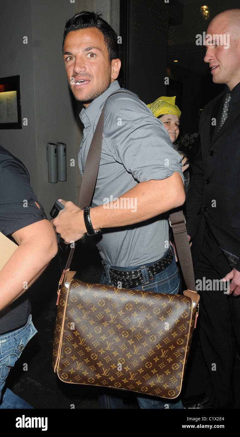 Peter Andre outside his hotel with a Louis Vuitton man bag London