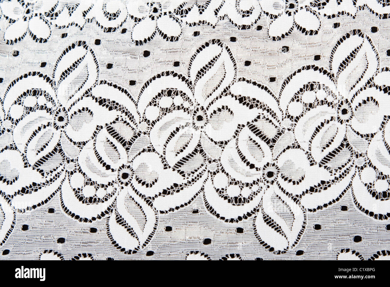 White lace with pattern in the manner of flower by background Stock ...