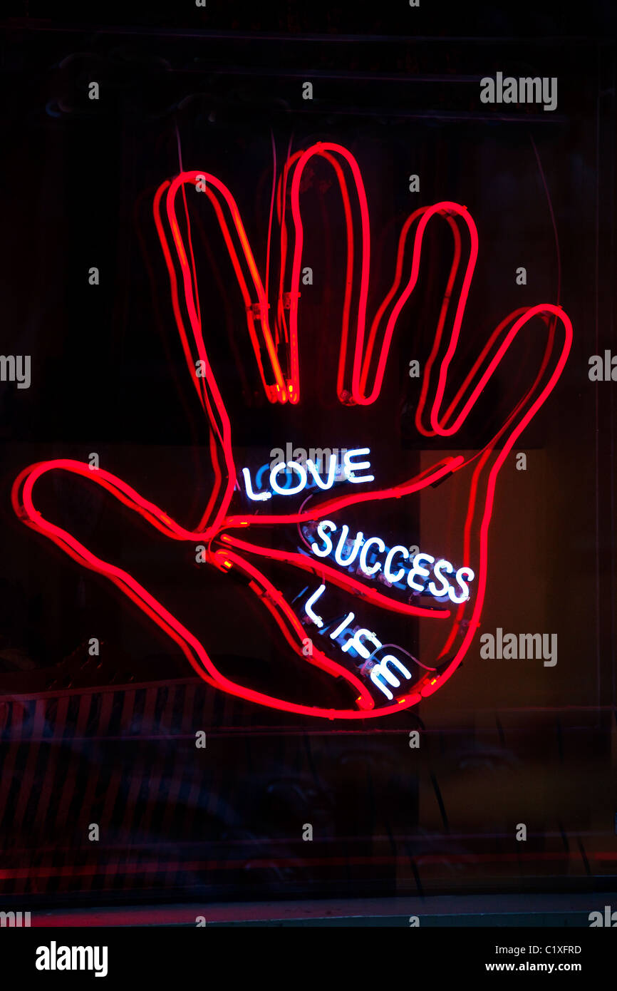 Palm reader neon sign Stock Photo