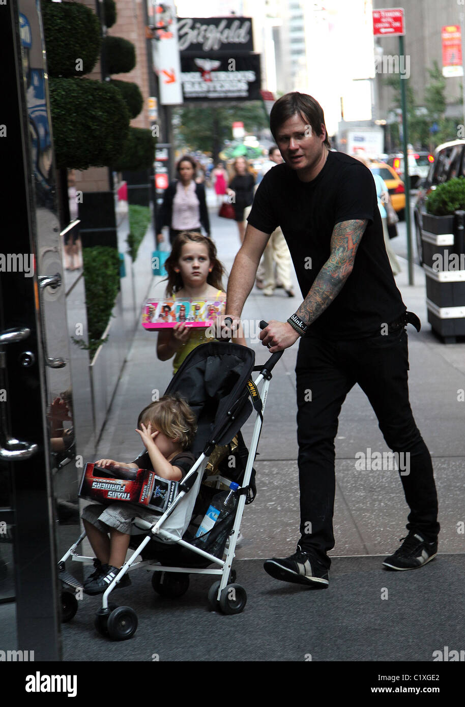 Tom DeLonge walks through Soho with his daughter Ava Elizabeth New York