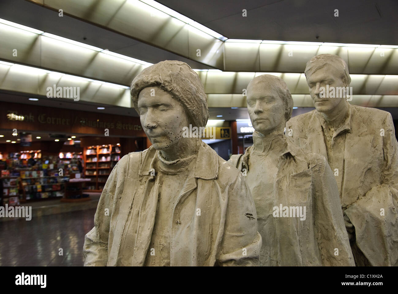 The Commuters, Next Departure, 1980, by George Segal, American, 84”x72”x96”, Bronze with white patina, Grand Central Terminal,.. Stock Photo