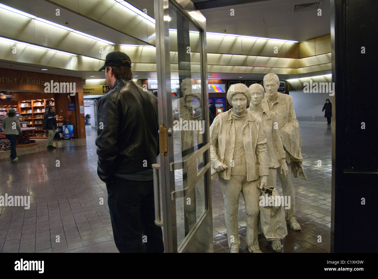 The Commuters, Next Departure, 1980, by George Segal, American, 84”x72”x96”, Bronze with white patina, Grand Central Terminal,.. Stock Photo