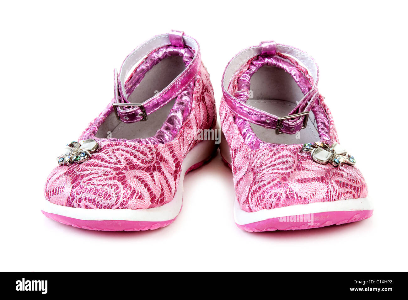 Rose baby sandals insulated on white background Stock Photo