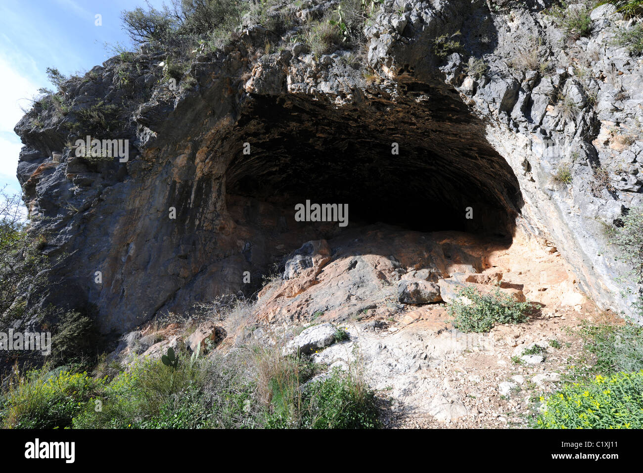 cave at site of (Macro Schematic) rock art, Pla de Petracos, Castell de Castells, Marina Alta, Alicante Prov. Valencia, Spain Stock Photo