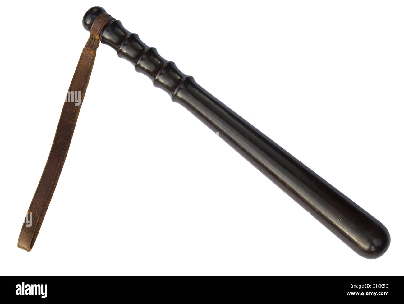 Wooden truncheon with leather strap, c. 1940s (cutout) Stock Photo