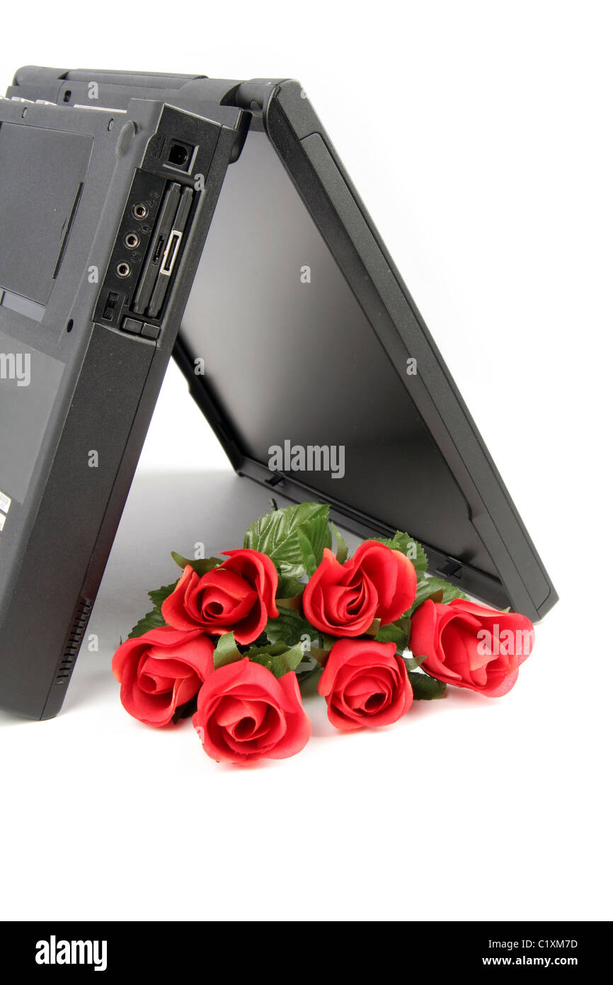 Red Roses In Computer Red rose on laptop computer hi-res stock photography and images - Alamy