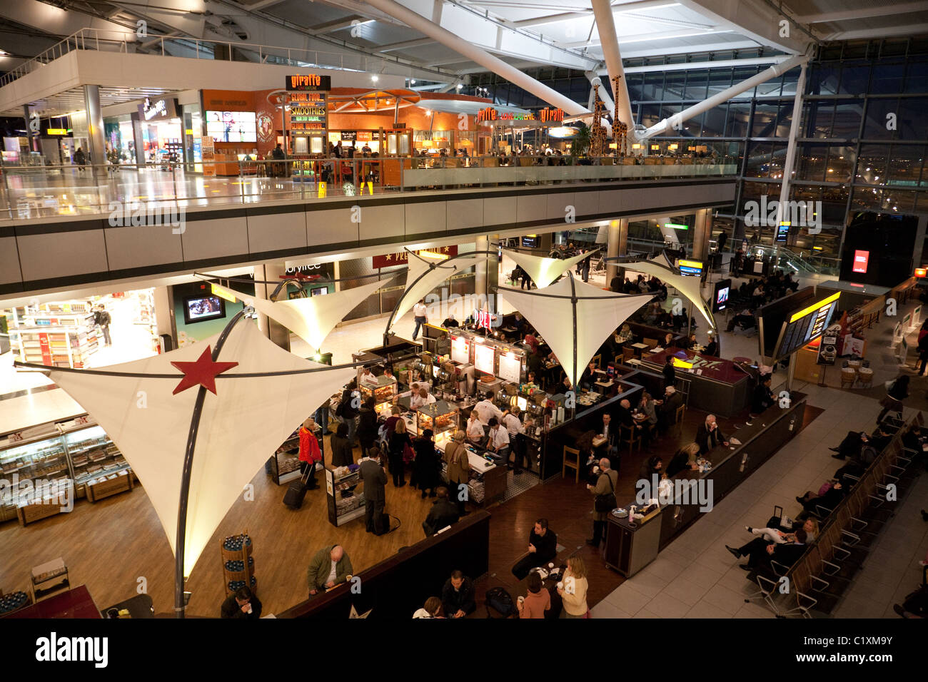 The departure lounge, terminal 5, Heathrow airport, London, UK Stock