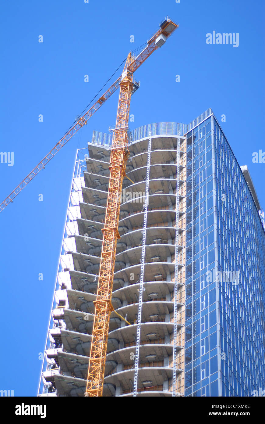 construction of modern skyscrapers and building crane Stock Photo Alamy