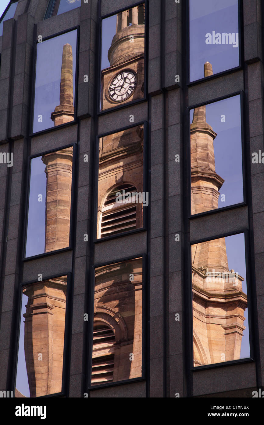 St George's Tron Church reflected in the mirrored glass façade of a building on Buchanan Street, Glasgow city centre, Scotland UK Stock Photo