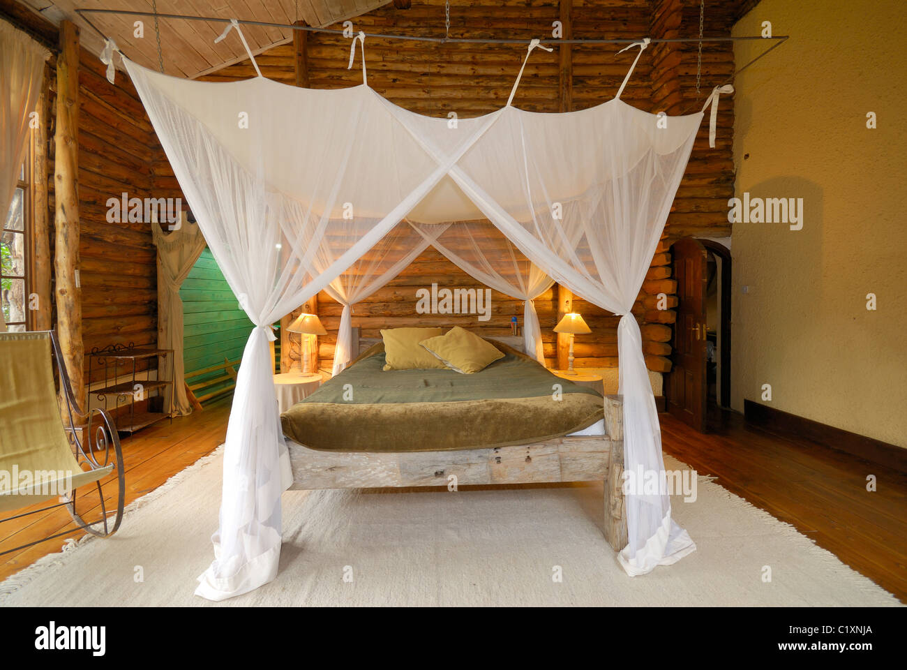sleeping room of log cabin in Ngong House Safari Hotel, Nairobi, Kenya, Africa Stock Photo Alamy