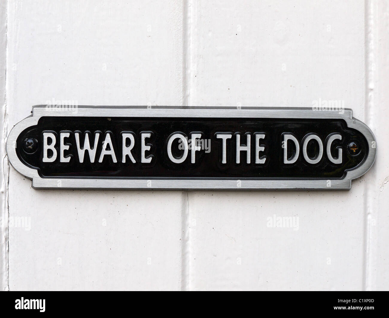 metal beware of dog sign