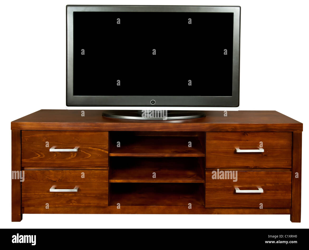 A classic brown wooden TV cabinet with a large LCD TV on it. Stock Photo