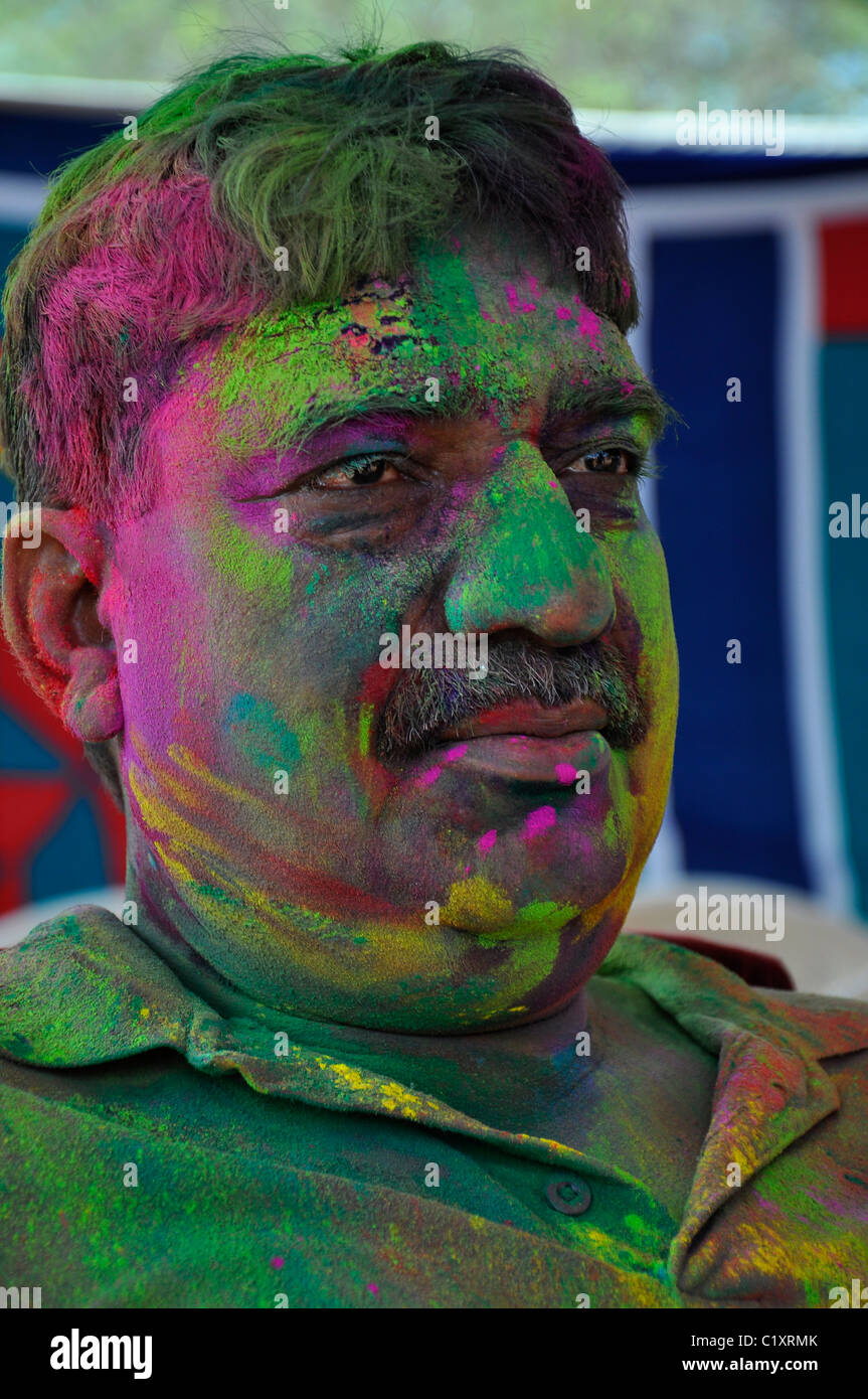 One Indian with colors on his face Stock Photo
