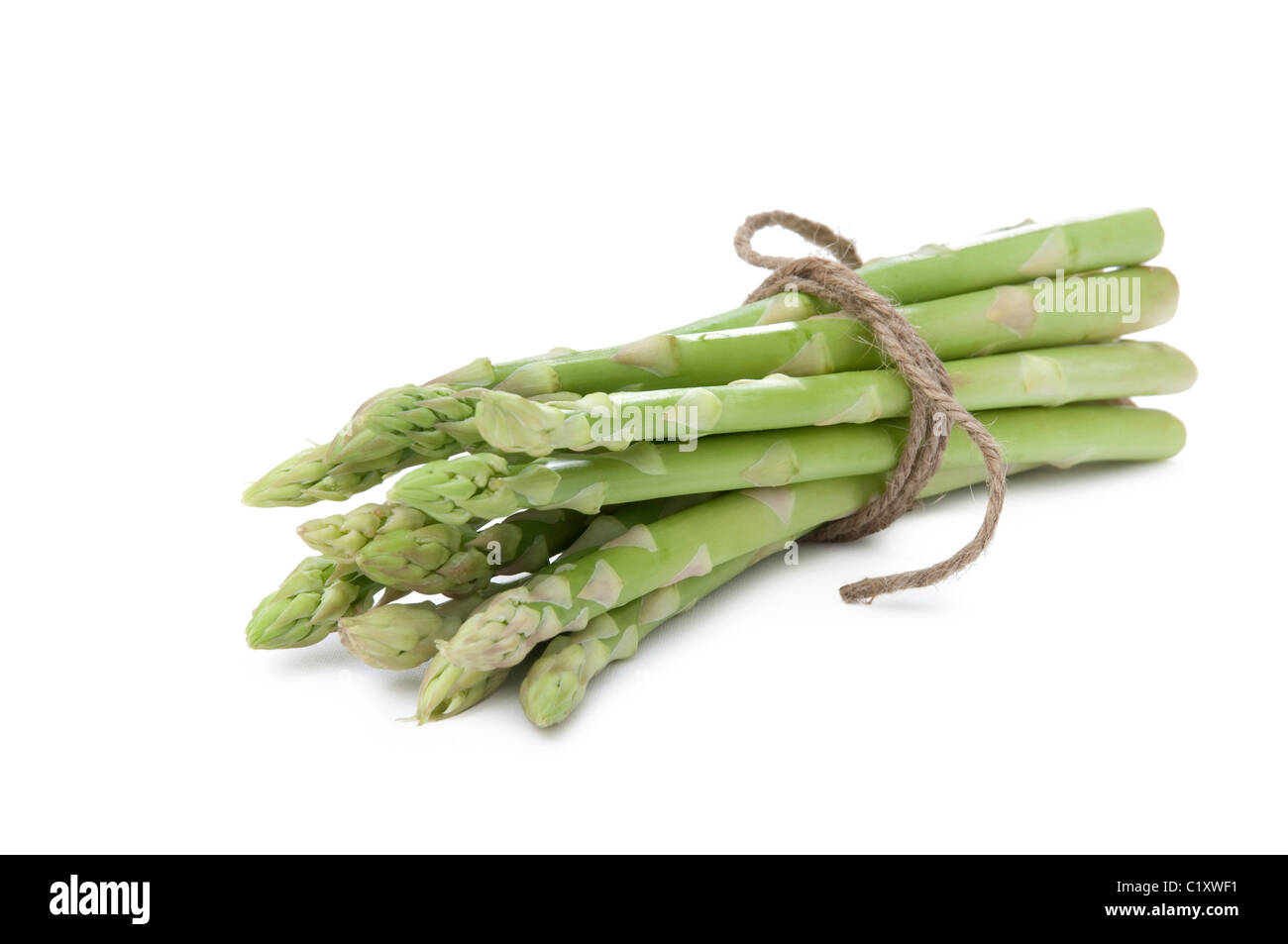 Asparagus spears tied with sting. Stock Photo